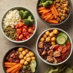 Four budget-friendly high-protein meal prep bowls with chicken, turkey, tofu, tuna, rice, beans, and vegetables.