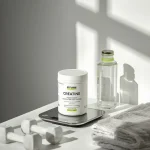 Beginner-friendly creatine monohydrate supplement beside a water bottle and simple strength-training equipment